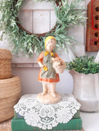 Vintage Yellow & Orange Aged Chalkware Farm Girl Statue